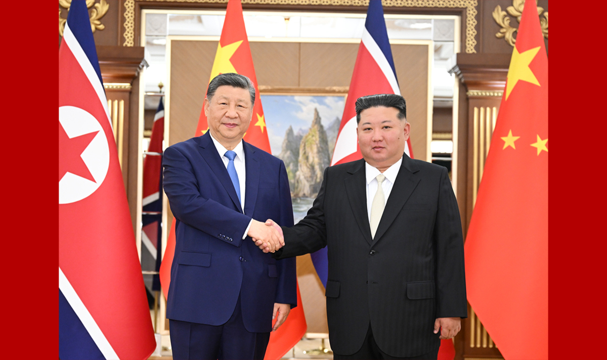 习近平同金正恩举行会谈
